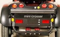 Vid transport i en kombibil SKA Mini Crossern göras fast i bilens golv. Öglor för fastspänning.