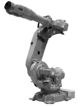 Figur 12. IRB 6640 och styrskåp. (ABB, 2011) Vilka artiklar som ingår i styrskåp och mekanisk robot är beroende av hur de kombineras samt vilken applikation som roboten skall användas till.
