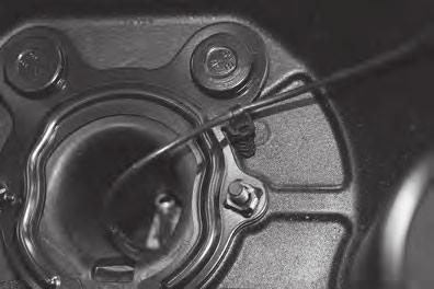 plastic fastener Figure 7 securing the rear view camera