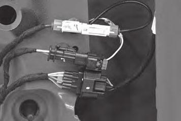 If installing the Accessory Bracket, bolt it on with the top two bolts. Tighten hardware.