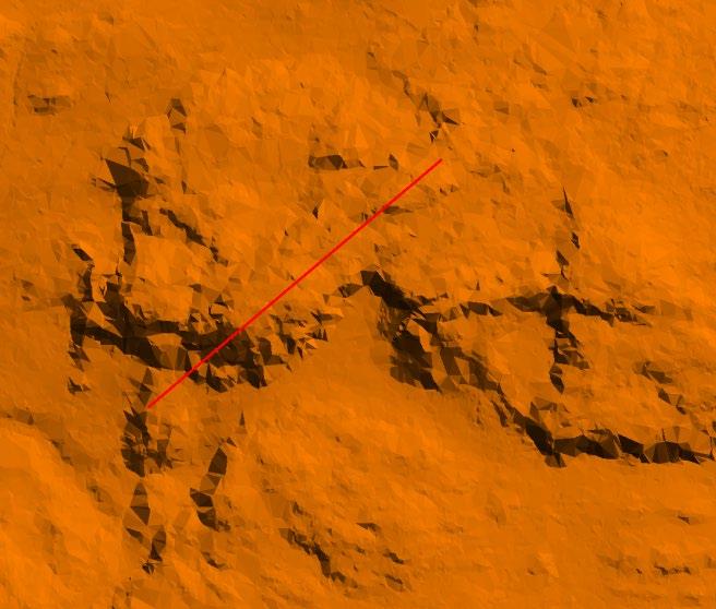 Profilen är dragen vid det röda strecket i bilden nedan. 100 m Figur 13: Terrängskuggad bild över kullen i föregående bild.