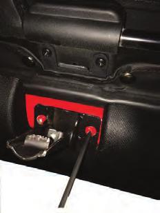 Place provided latch as shown and reattach