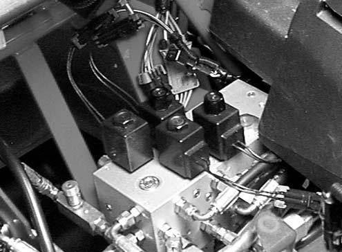 The relay should make and break 30 continuity between terminals 30 and 87 as 12 VDC is ap- 85 30 plied and removed from terminal 85. 3. Disconnect voltage from terminal 85 and multimeter lead from terminal 87.