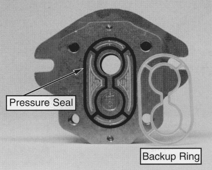 IMPORTANT: Mark the relative positions of the gear teeth and the bearing blocks so they can be reassembled in the same position.