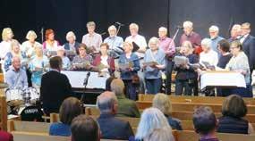 Immanuelskyrkan med solisterna Jennie Svedberg och Anders Nilsson, kör och kompband.