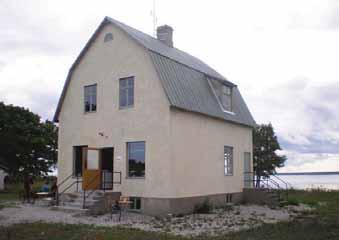 Fabriksområdet Ugnarna Kontor Bostad Konsum Högbryggan i trä Gamla Konsum Konsumbutiken, uppförd som lanthandel med bostad på övervåningen ca1928. Foto troligen 1929.