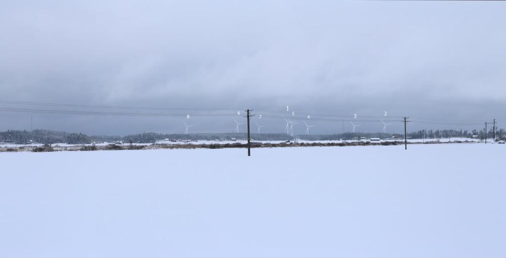 Betydande utsikt mot vindkraftverken öppnar sig från Drombom och Drombomvägen när man närmar sig Liljendal.