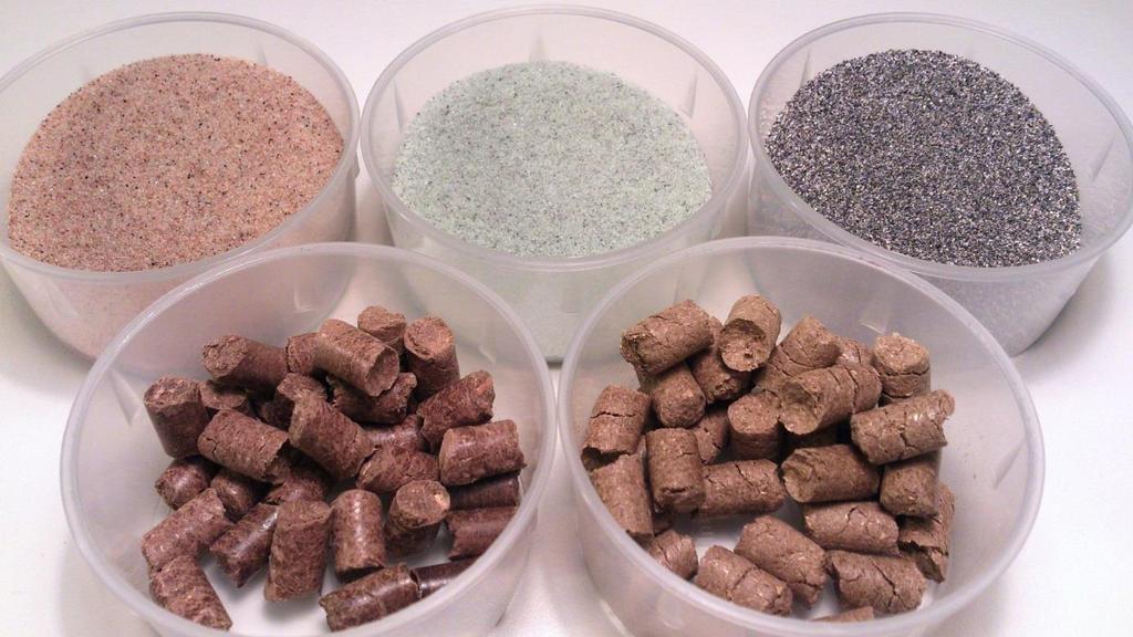 21 Figure 3-3. The prepared bed materials and fuels used. Upper row: sand (left), olivine (center) and bauxite (right). Lower row: forestry residue pellets (left) and wheat straw (right).