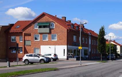 Tapetseraren 7 Flerbostadshus med butikslokal (1950-talet) I nordöst, i anslutning till