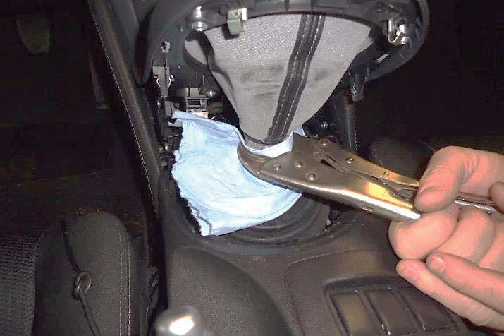 5. Hold the shift lever stationary with locking pliers.