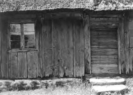 Östra fasaden 1946. Bilden är tagen före 1960-talets omfattande renovering och visar hur fasaden var klädd med panel ända upp till knutskallarna. underhållet varför Agusa byalag bildades.
