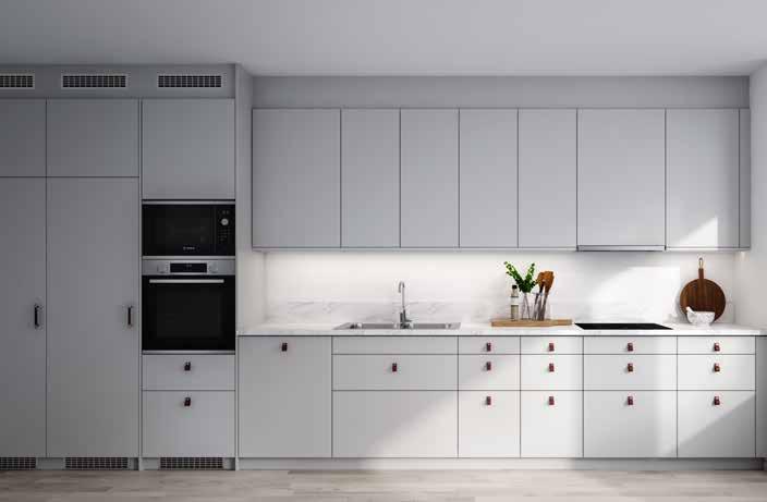 Fem stilar Trend Luckornas grå färg kombinerat med läderhandtagen och marmorkompositen ger köket en trendig karaktär som ligger i tiden.