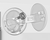 216 Körning och hantering Påfyllningsventilen för flytande gas sitter bakom tanklocket. Skruva fast den adapter som krävs för hand på påfyllningshalsen. Tratten är placerad i lastrummet.