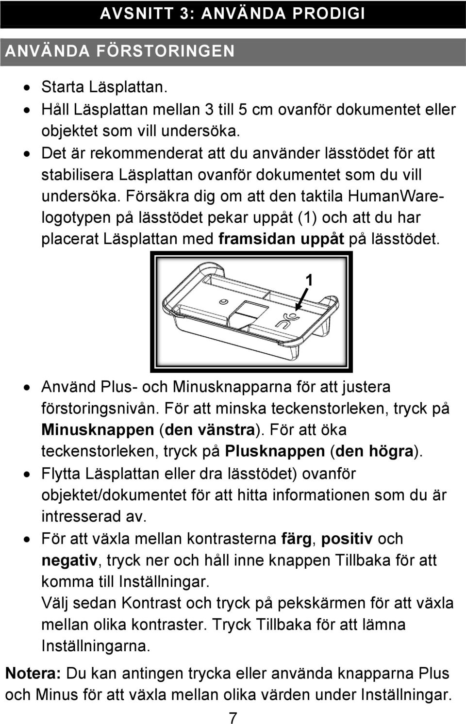 Försäkra dig om att den taktila HumanWarelogotypen på lässtödet pekar uppåt (1) och att du har placerat Läsplattan med framsidan uppåt på lässtödet.