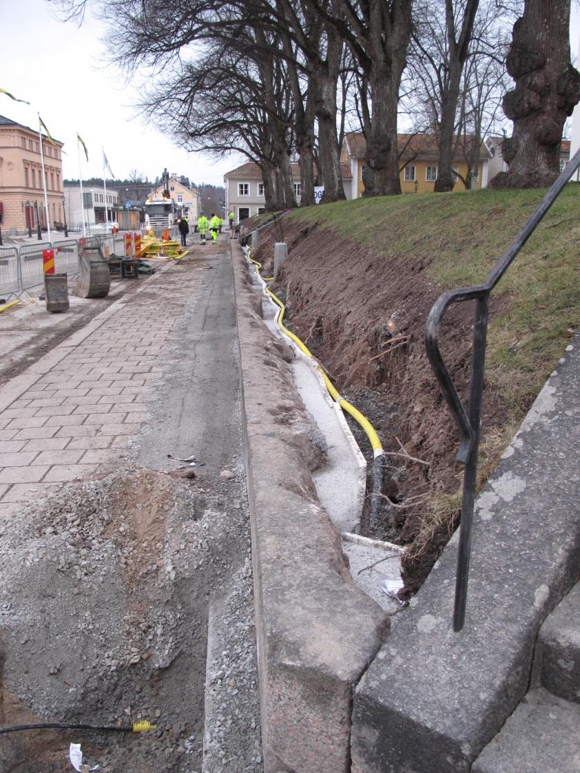 Renovering av södra muren kring kyrkotomten vid Nora