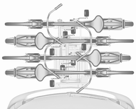 Förvaring 73 1. Sätt fast adaptern på den bakre cykelhållaren som bilden visar. 2. Vrid spaken (1) framåt och håll den kvar, varefter adaptern (2) sänks baktill. 3.