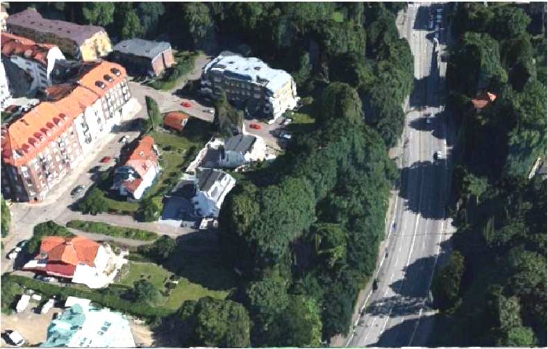 2.7. MODELLERING AV BYGGNADER I 3D (a) Scen i Google Earth från Hamburg (b) Scen över Helsingborg från C3-Technologies Figur 2.