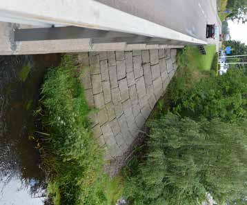 11-67-1 Bro över Rönneån vid Spången En typsik stenvalvbro från 1920-talet i det stora formatet. Två flacka stickbågiga valv och ett omsorgsfullt gjort stenhuggeriarbete.