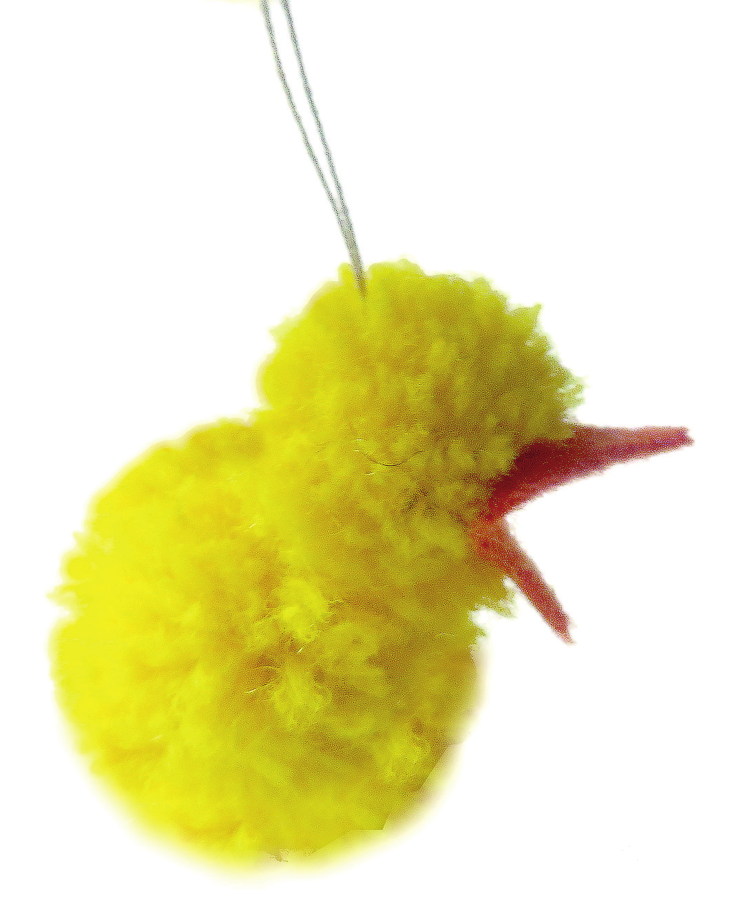 Material Garnkyckling Börja med att klippa till en kartongbit på ca 3 x 7 cm. Vira ullgarnet runt kartongbiten ca 75 varv. Ju fler varv desto tätare boll.
