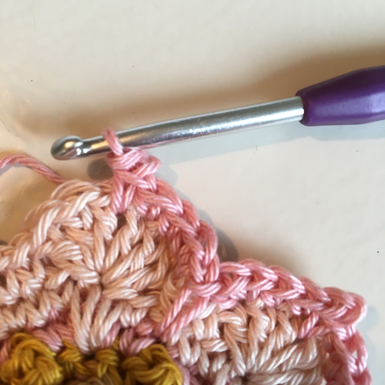 Then you make a slip stitch through the front loop and the