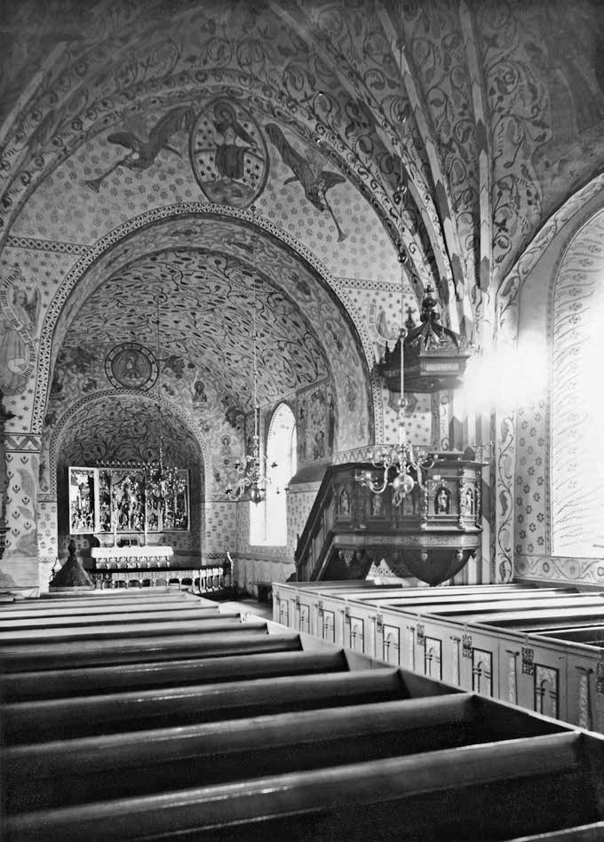 Fig. 71. Funbo kyrkas interiör efter Fredrik Falkenbergs restaurering 186. Medeltida målningar har framtagits och kompletterats, så att de nästan täcker väggar och valv.