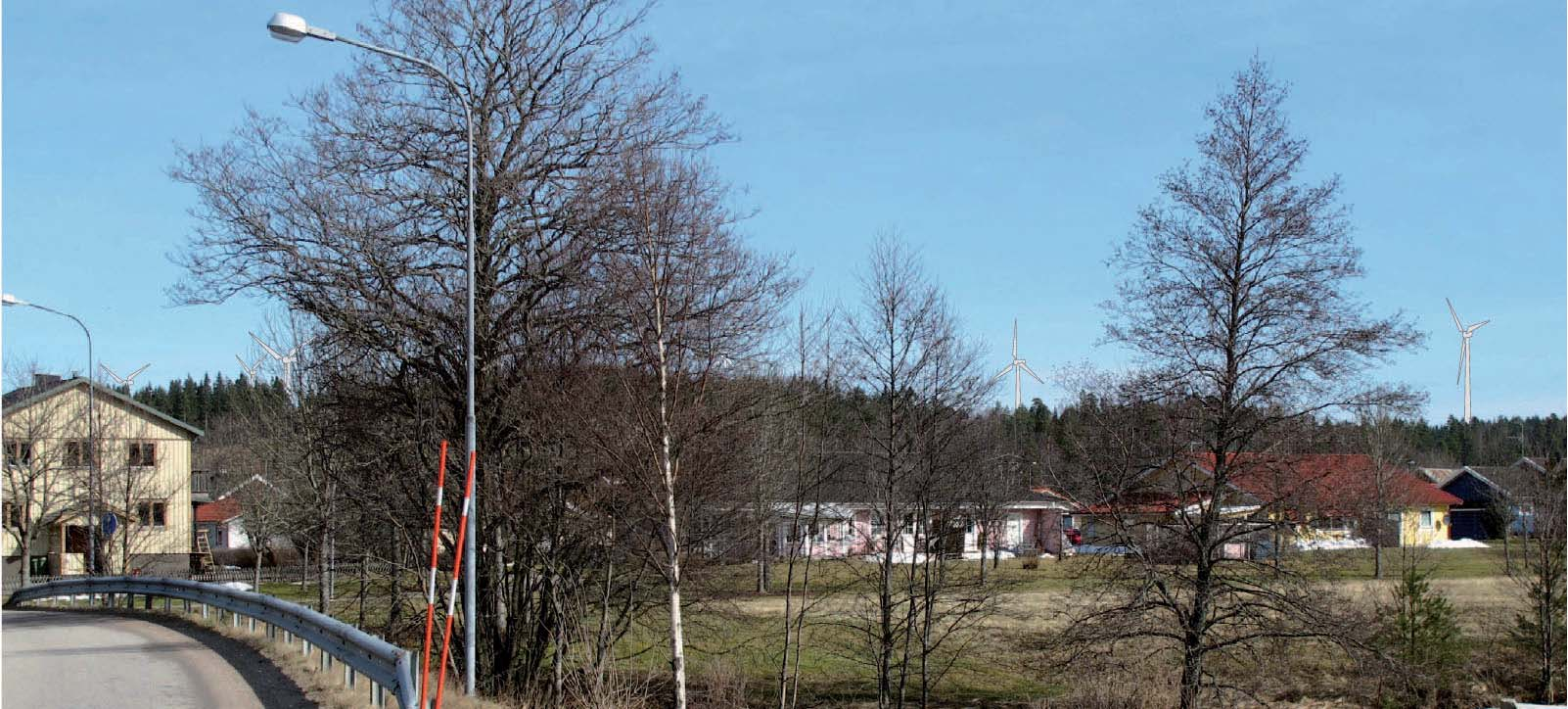 Fotomontage av möjliga vindkraftverk om 150 meter i området Älmåsaberget. Fotot är taget från södra infarten till Töllsjö tätort.