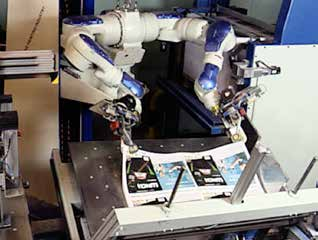 KONVENTIONELL PÅLÄGGNING AV ARK Roboten för arken långt fram över skakbordet och