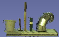 helautomatiskt modelleringsprogram: en hink, en hammare, en bräda med måtten 3,5 * 3,5 cm, en pärm med ryggen riktad mot skannern samt en rörböj (se figur 2).