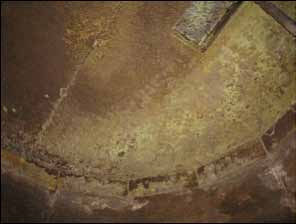 Corrosion on a floor of concrete in