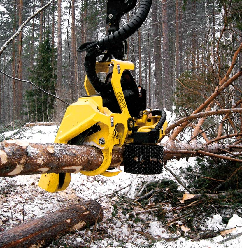 Kvistning John Deere skördaraggregat är utrustade med kvistknivar som är anpassade för kvalitetskvistning av alla stamdimensioner.