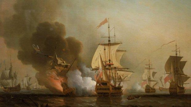 Guld för 8,5 miljarder hittat i vrak Galjonen San José exploderar efter en timmes beskjutning utanför Cartagena visualiserat av konstnären Samuel Scott (1702 1772).