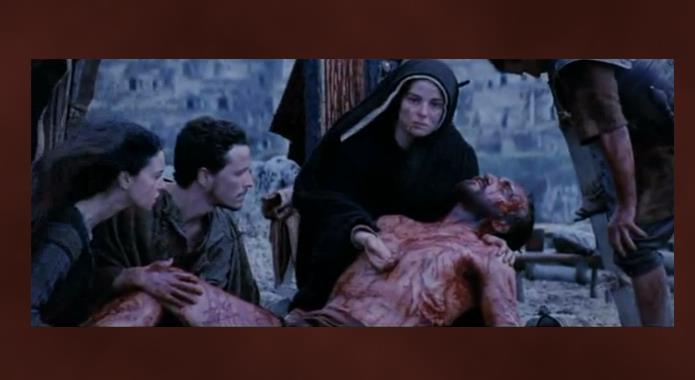 Jesus lärjungar och mamma plockar ner Jesus från korset sveper honom i