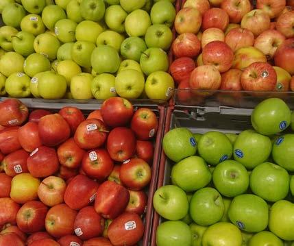 Ekologiska äpplen Bilden visar hur en butik har gjort det extra tydligt för kunderna genom att placera de ekologiska röda äpplena bredvid konventionellt odlade gröna äpplen.