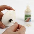 På den halva utan prickar, stryks ett tunt lager Fix Glue med en