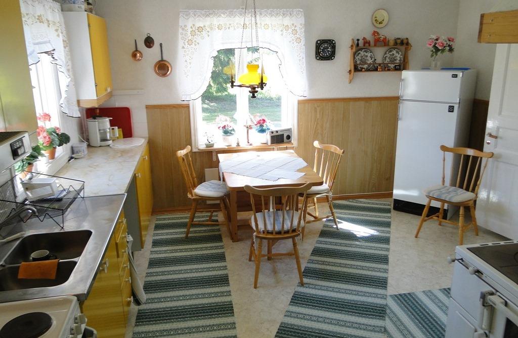 Loge med gjutet golv Kök
