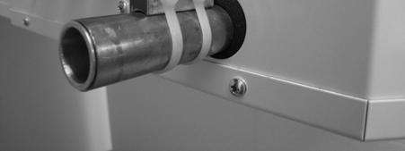 Loosen the six screws holding the director (Figure 12), remove and rotate a half turn. Retighten the screws.