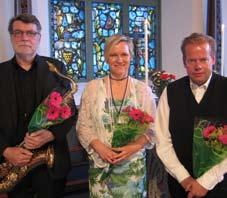 Bild 10: Roland döper Emelia Nike i Skags kapell 23 augusti.