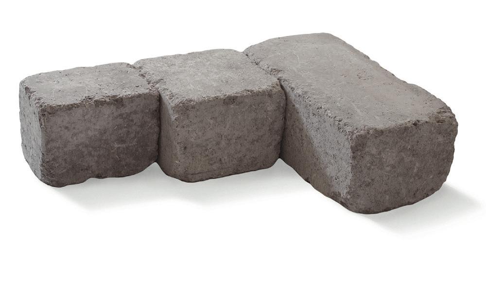 Blocket är en mångsidig mursten som fungerar lika bra som kantstöd, låg mur