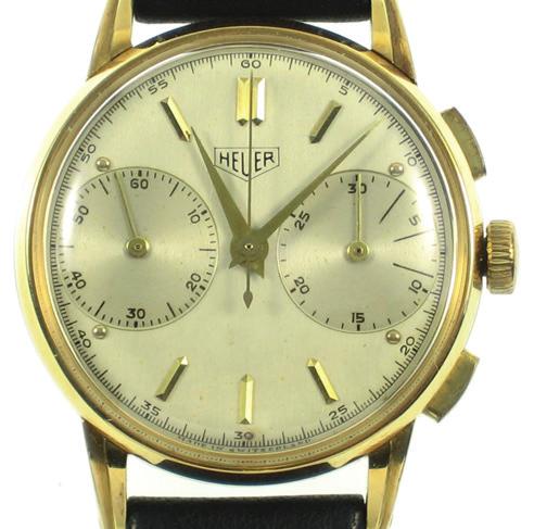 International Watch Co (IWC) i stål. Automat med centrumsekund. Kaliber 853 med 21 stenar. Schweiz 1961. Diam 34 mm 8.850:- 52. Enknappskronograf i 14k.