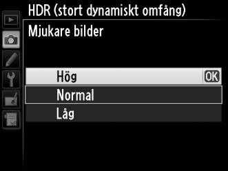 Välj högre värden för högkontrastmotiv, men tänk på att om du väljer ett värde högre än som behövs kanske du inte får önskat resultat; om Auto väljs, kommer kameran att automatiskt justera