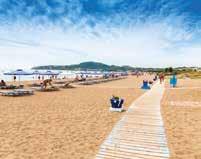 grönskande gräsmattor En kort promenad från hotellet ligger Falirakis vidsträckta sandstrand Smidigt och gott med All Inclusive Sun Beach breder ut sig över ett fint område precis vid en underbar