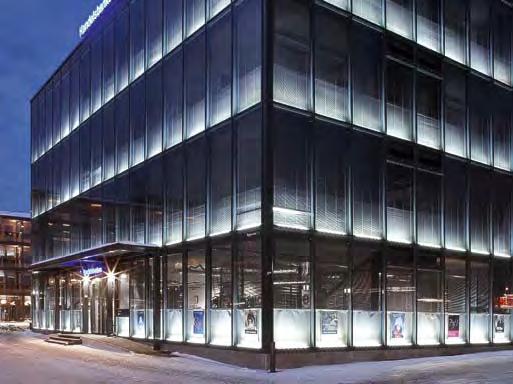 Raisio centrum, Helsingfors, Finland. Pilkington Optifloat Grey De genomfärgade sol - skyddsglasen finns som Pilkington Optifloat i grått, brons och grönt, samt som Pilkington Arctic Blue.