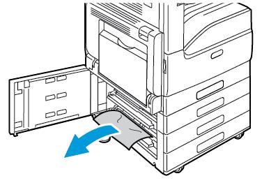 Ta bort papper som har fastnat från pappersmagasinets matningsområde. Obs!