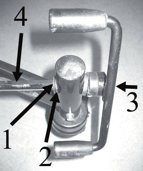 10) Lever for adjustment of seat height.