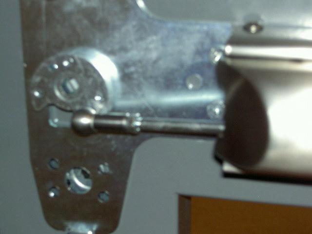 horizontal position and attach the rear mounting bracket firmly with one screw to the door. 10.