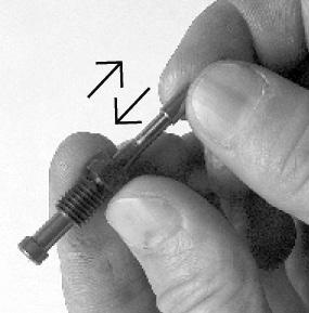 Release the lock nut, turn the pad and blade to the required position, and tighten the lock nut.