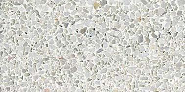Material/ Material Fasaden mot Slättgårdsvägen har en lätt sockel av träpelare och glas med en tung fasad i tufasten.