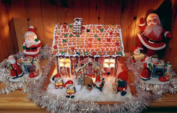Tomtar och pepparkakshus hör julen till. Foto: Colourbox prinskorvar och risgrynsgröt. Man delar ut presenter som man kallar julklappar. Många familjer har julgran.
