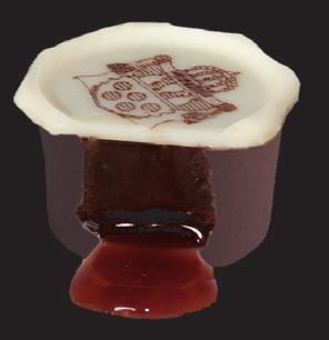 Mycket god tillsammans med en kopp varm choklad. Extra populär i juletid. 2007 Pralin: Öl & Apelsin Tema: Svenskt 20-tal med inriktning på charleston och öldrycker.