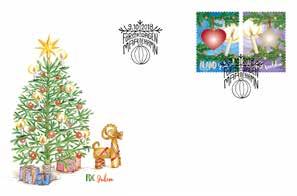 Förstadagsstämpeln visar en kvist med en julgransboll. Hjärtmotivet finns också som postkort att använda till årets julhälsningar.